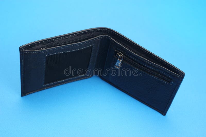 wallet black leather open on a blue background.