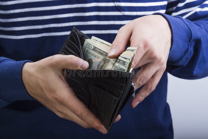 Man holding an empty wallet. Man holding an empty wallet