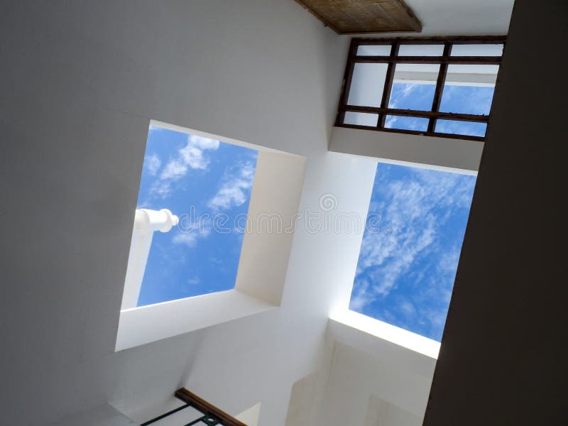 Walls with windows with bright blue sky stock images Walls with windows with bright blue sky stock images