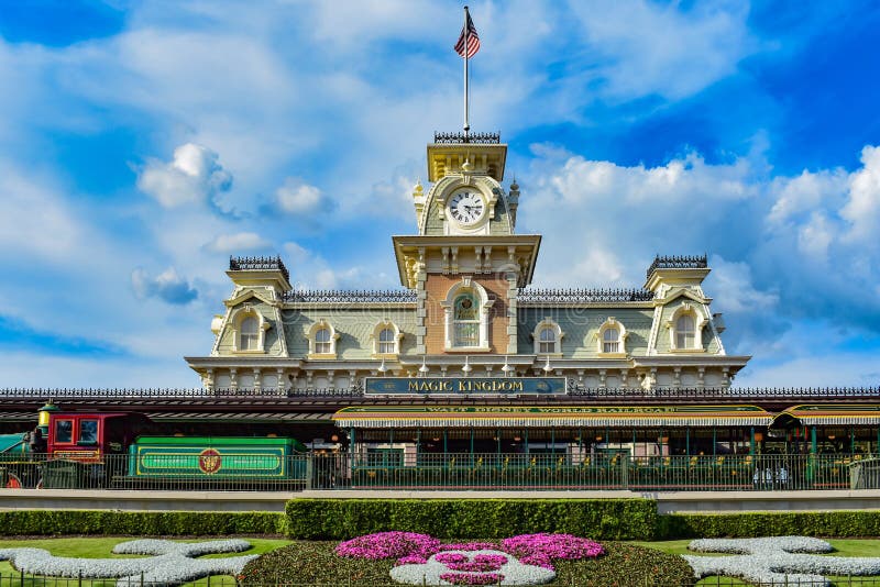 Orlando, Florida. March 19, 2019.  Walt Disney World Raildroad in Magic Kingdom on lightblue sky cloudy background 1. Orlando, Florida. March 19, 2019.  Walt Disney World Raildroad in Magic Kingdom on lightblue sky cloudy background 1