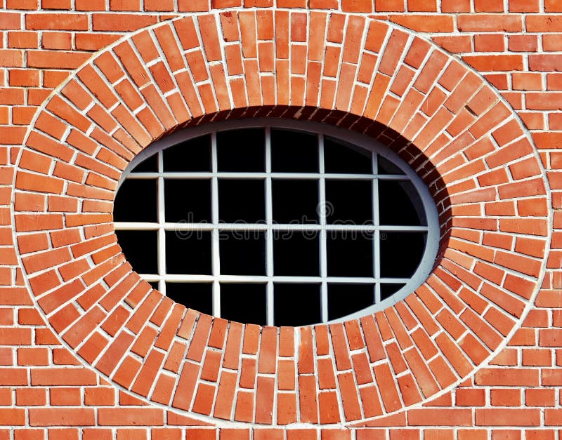 Ovales Fenster In Der Backsteinmauer Stockbild Bild von