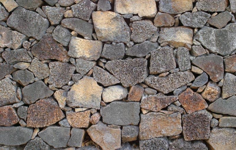 Wand des vulkanischen Felsens lizenzfreie stockbilder Wand des vulkanischen Felsens lizenzfreie stockbilder