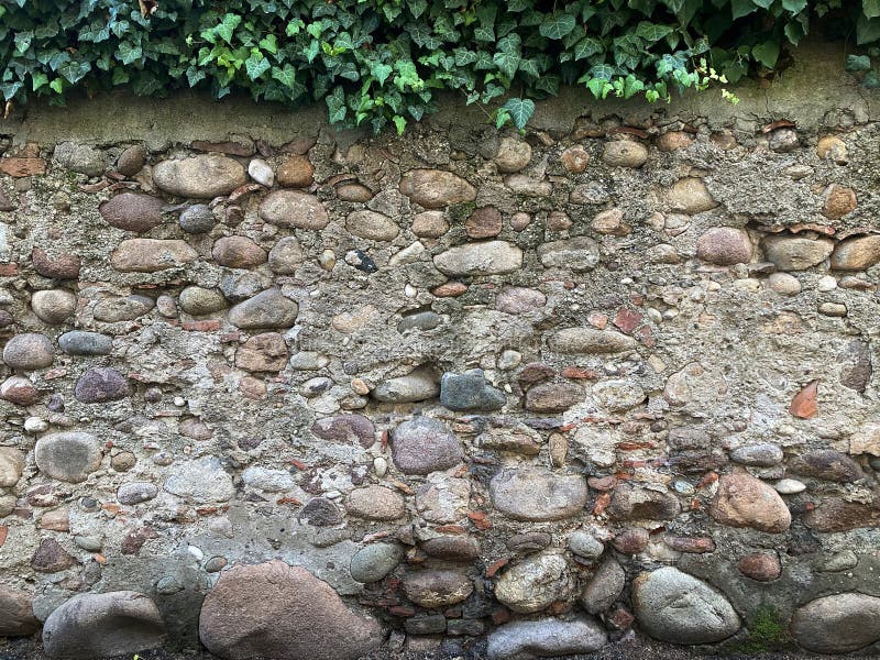 Wandbetonmauer aus Stein für Hintergrund oder Rendering stockfoto