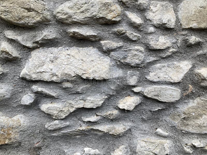 Wandbetonmauer aus Stein für Hintergrund oder Rendering stockbilder