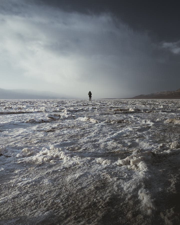 Wandering Through Badwater Basin Salt Flats in Death Valley on a Cloudy Day Just Before Sunset