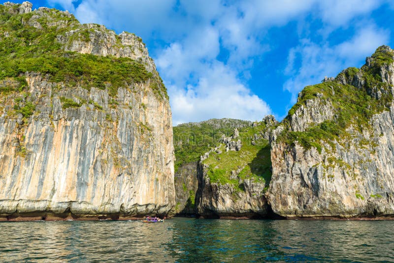 Wang Long Bay with crystal turquoise water, Tropical island Koh Phi Phi Don, Krabi Province, Thailand - Long boat in beautiful