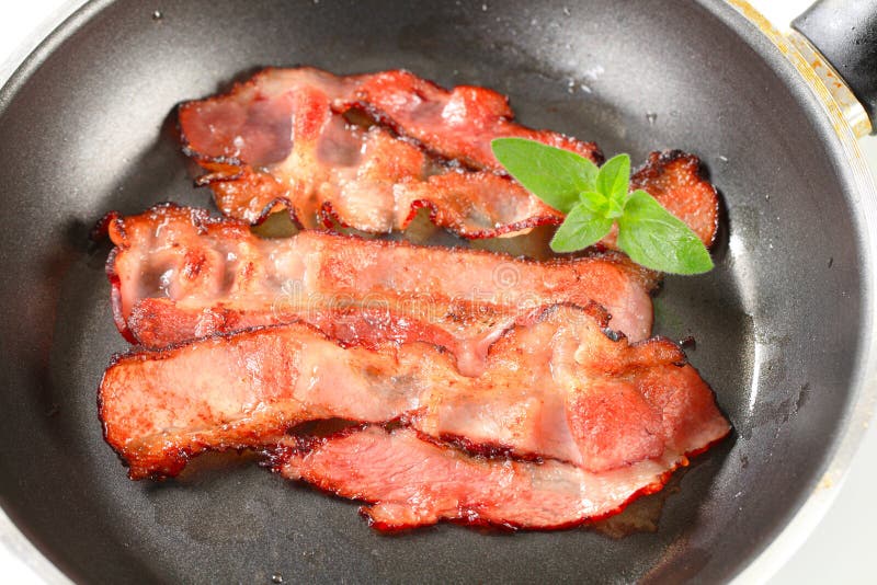 Wanne gebratener Speck lizenzfreie stockbilder