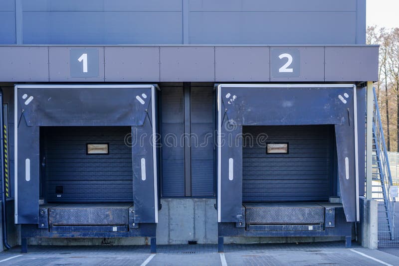 Warehouse dock with thermally insulated gate to minimize temperature change royalty free stock images Warehouse dock with thermally insulated gate to minimize temperature change royalty free stock images