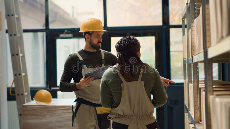 Warehouse employees complete orders royalty free stock images