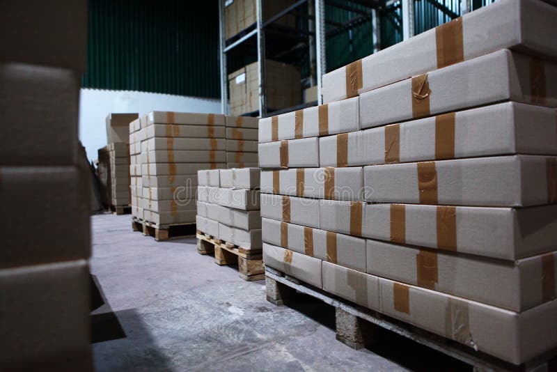 Warehouse Interior. Cardboard Boxes in a Distribution Warehouse.Shelves