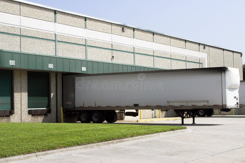 Warehouse Loading Bays with Trailer Stock Photo Image of ramp