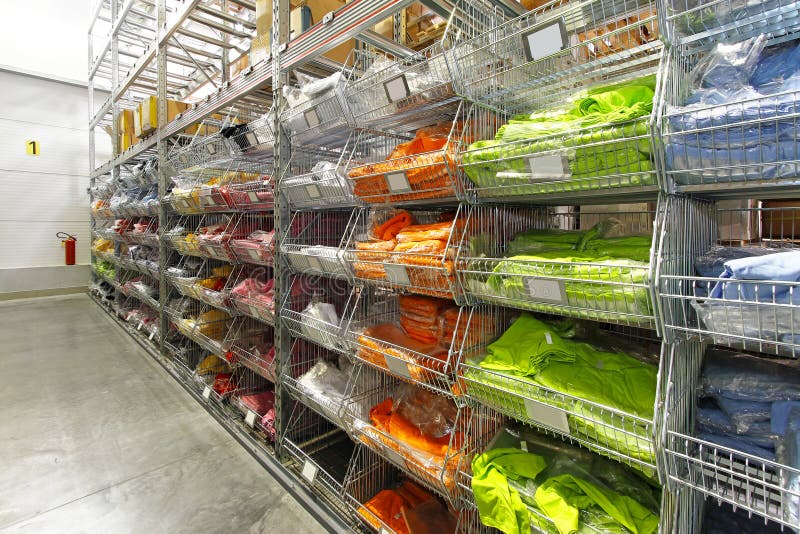 T shirts warehouse stock photo. Image of shelf, interior 28407326