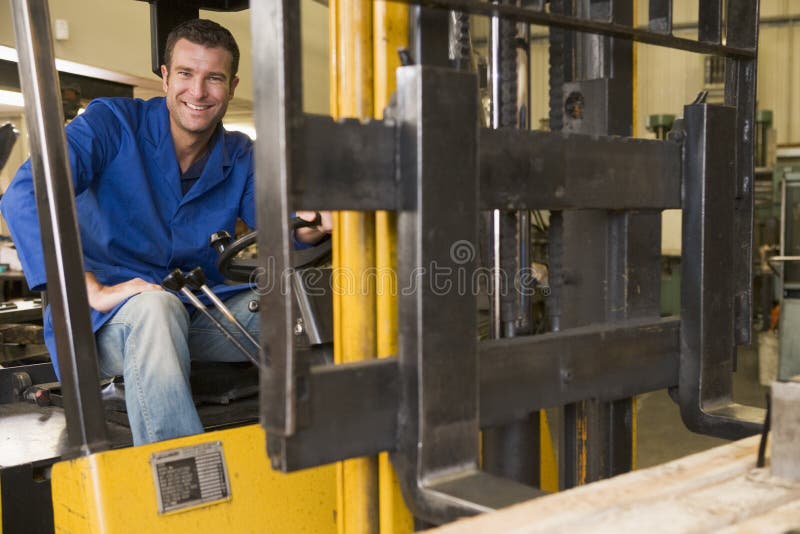 Warehouse Worker in Forklift Stock Image Image of forklift