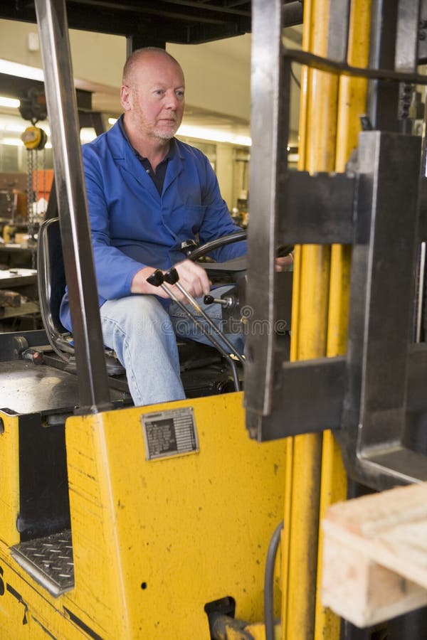 Warehouse Worker in Forklift Stock Photo Image of person, fifties