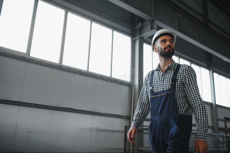 Warehouse Worker. Guy in Warehouse Worker Uniform. Stock Photo Image