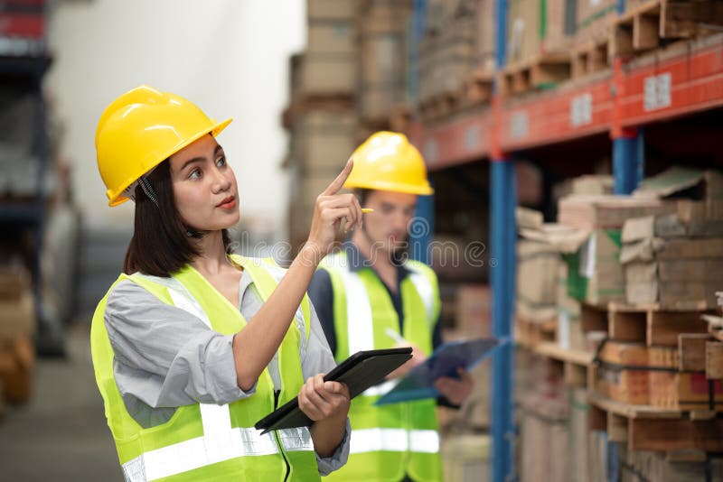 Warehouse Worker Working Together in Warehouse Stock Image Image of