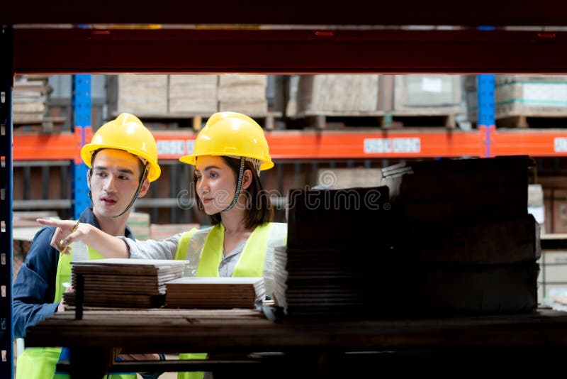 Warehouse Worker Working Together in Warehouse Stock Image Image of
