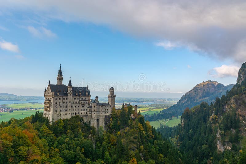 Landscape neuschwanstein castle with some lakes and mountains behind