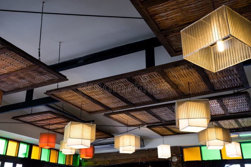 Warm Lighting Coming Out from Beautiful Lamps on Ceiling Stock Image