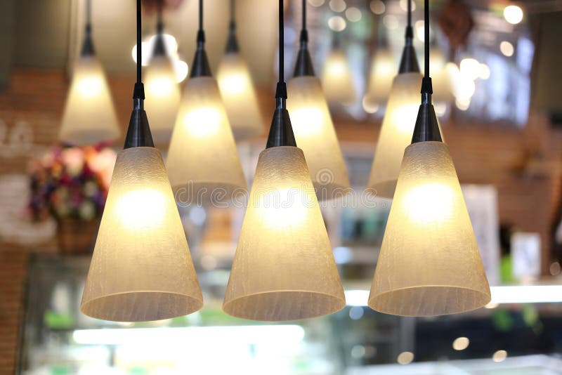 Warm Lighting Modern Ceiling Lamps in the Cafe. Stock Photo Image of