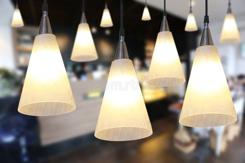 Warm Lighting Modern Ceiling Lamps in the Cafe. Stock Photo Image of