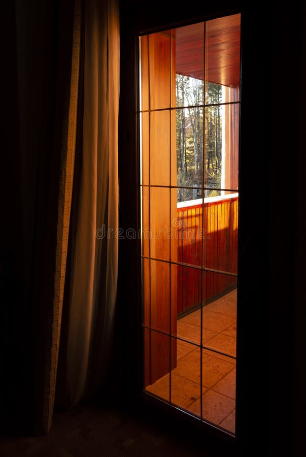 Warm Sunrise Light Coming In Through The Door On An Autumn Morning