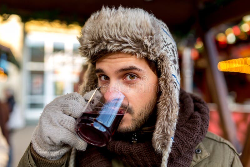 Its a german tradition that people meet on the christmas market in the days before christmas and enjoy their time together. They drink mullet wine, eat sausages and roasted mushrooms and have a lots of fun in the cold winter evenings. Like on the Picture you see that people also can easily fall in love or flirt on the market. Its a german tradition that people meet on the christmas market in the days before christmas and enjoy their time together. They drink mullet wine, eat sausages and roasted mushrooms and have a lots of fun in the cold winter evenings. Like on the Picture you see that people also can easily fall in love or flirt on the market