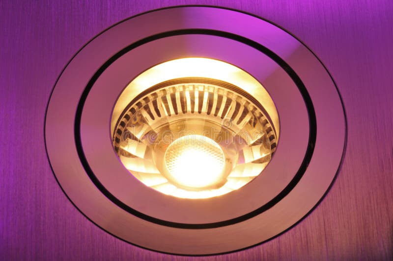 Macro detail of a warmwhite COB-LED in pink spotlight