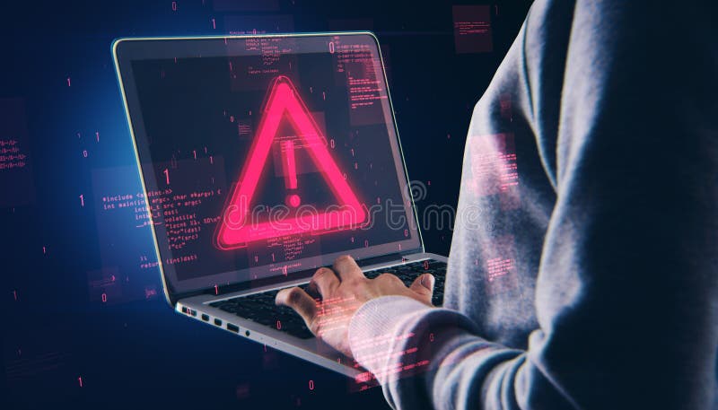 Warning exclamation mark on a laptop screen surrounded by digital code in a dark background, alert concept stock image