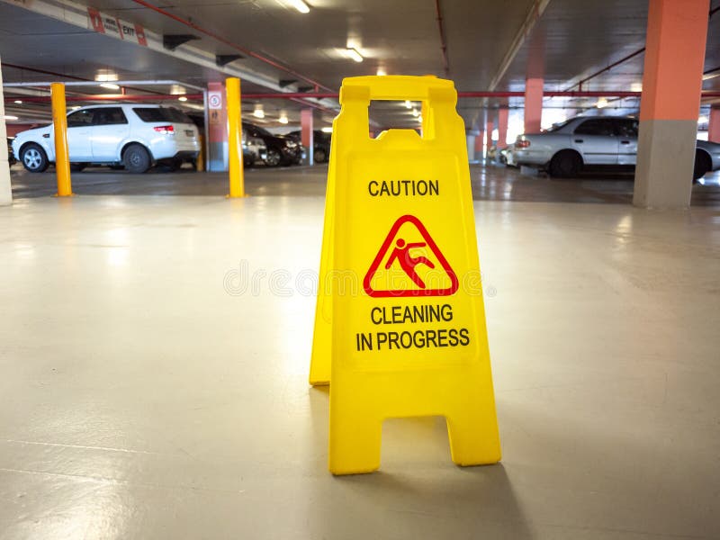 Warning Janitorial Sign of Cleaning in Progress in Car Park To Warn Passersby for Safety Stock Image - Image of progress, garage: 186650477