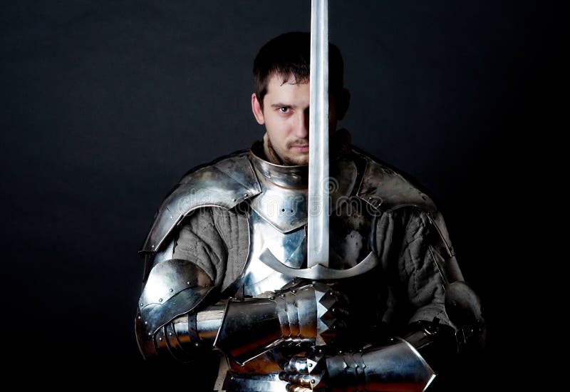 Warrior holding his great sword stock images Warrior holding his great sword stock images