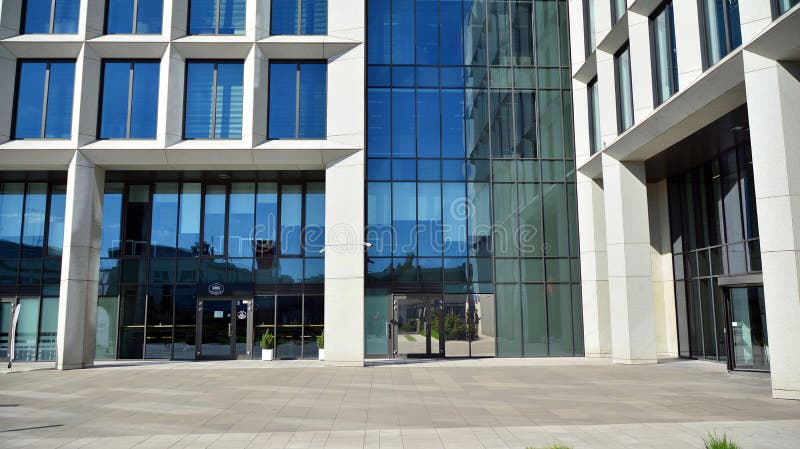 Architectural fragment of the entrance of the modern office building in Mokotow district. stock photos