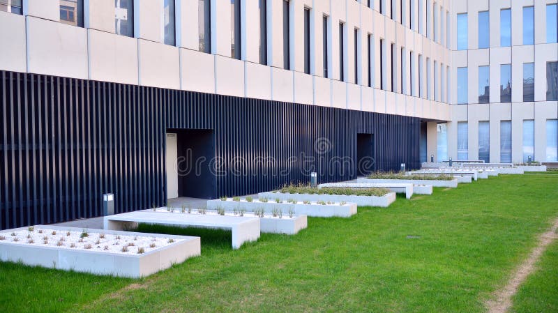 Architectural fragment of the entrance of the modern office building in Mokotow district. stock image