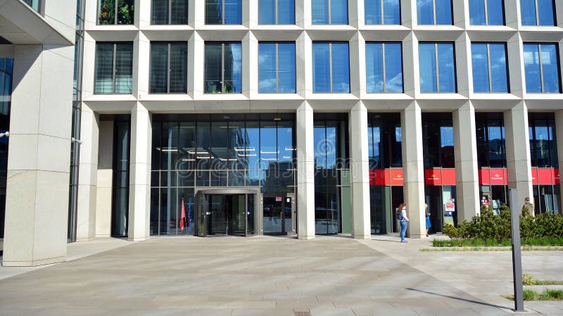 Architectural fragment of the entrance of the modern office building in Mokotow district. stock photo