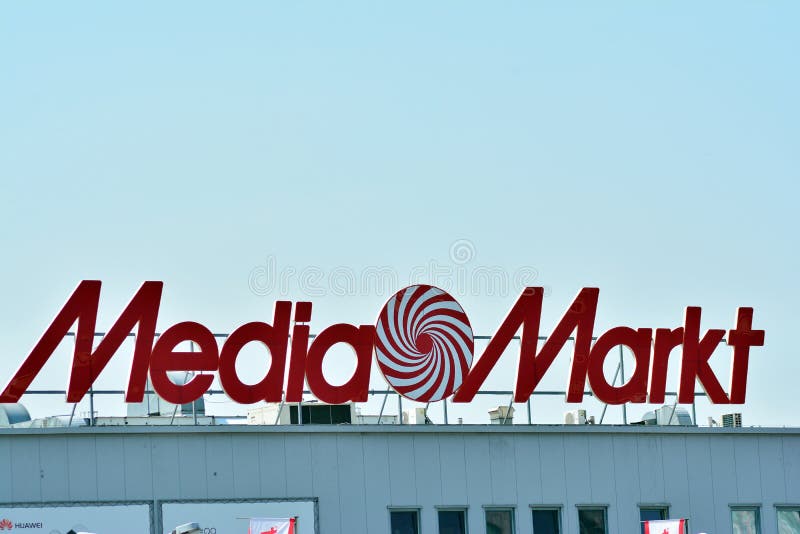 Ghent, Flanders, Belgium - 02 20 2021: The Mediamarkt and Delhaize retail  shops and parking Stock Photo - Alamy