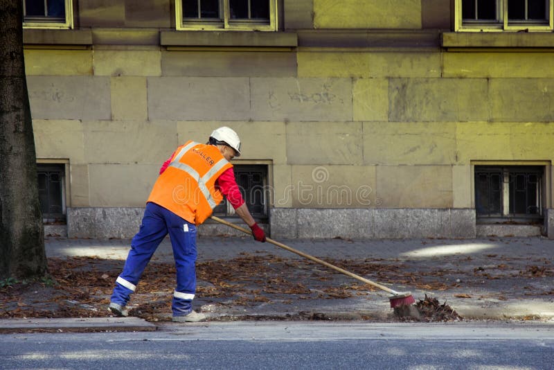 Morning job is janitor, sweep streets stock image Morning job is janitor, sweep streets stock image