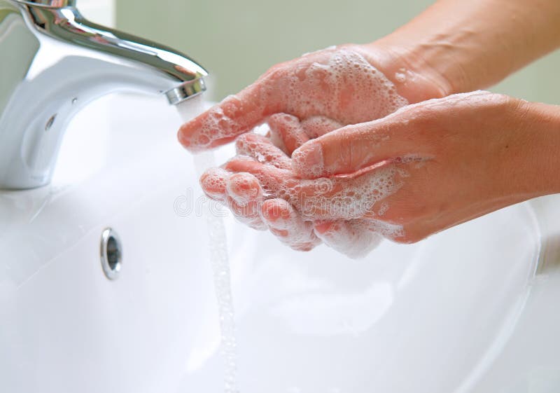 Waschende Hände lizenzfreies stockbild Waschende Hände lizenzfreies stockbild