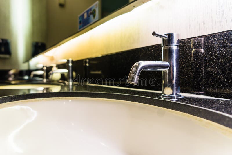 Washbasin in a Dirty Bathroom in an Old Hotel. Stock Photo Image of