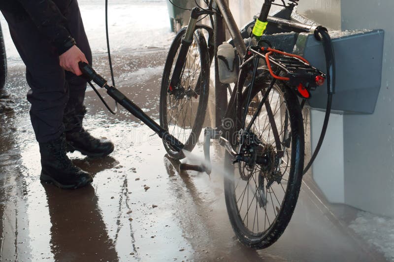 Washing the Bike with a Hose Under Pressure, Washing the Bike Stock Photo Image of dirty