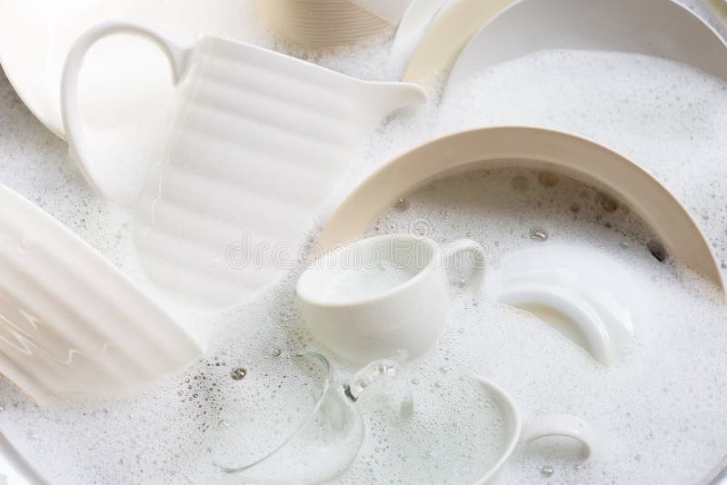 Washing Dishes, Utensils Soaking in Kitchen Sink Stock Photo Image of