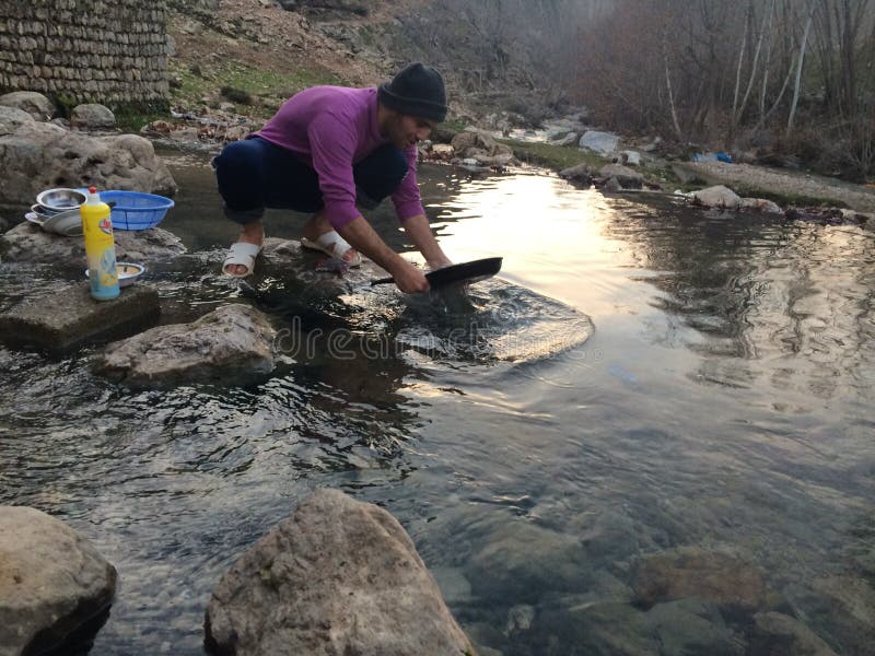Washing dishes stock images