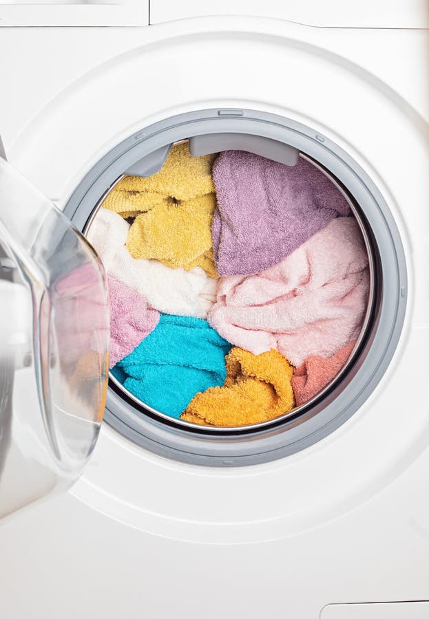 Washing or Drying Machine Loaded with the Laundry. Washing, Spring