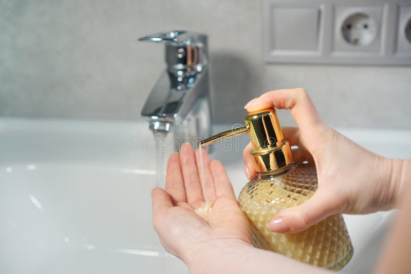 Washing Hands with a Liquid Soap Dispenser Stock Photo Image of