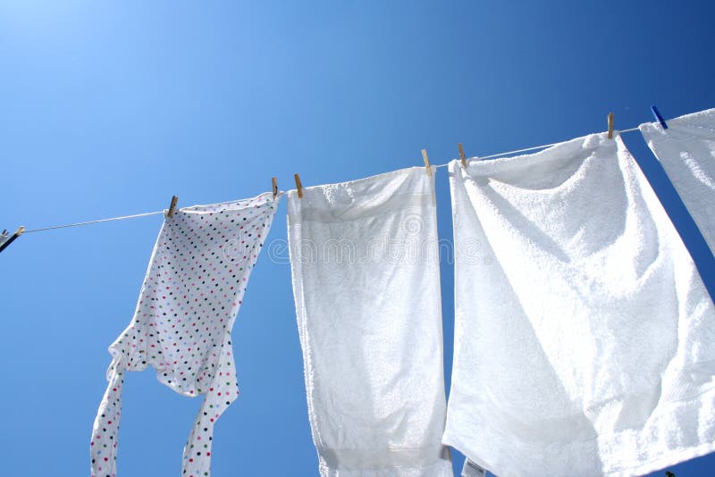 Towels Drying on a Clothes Line Stock Photo - Image of home, colored ...