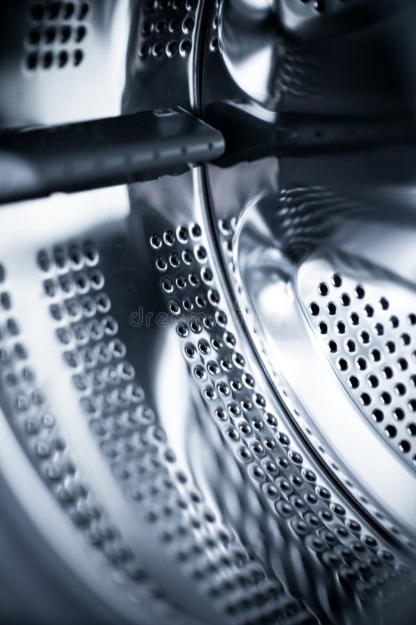 Washing machine - interior view of a washing drum. Metal steel drum stock images, royalty-free photos and pictures
