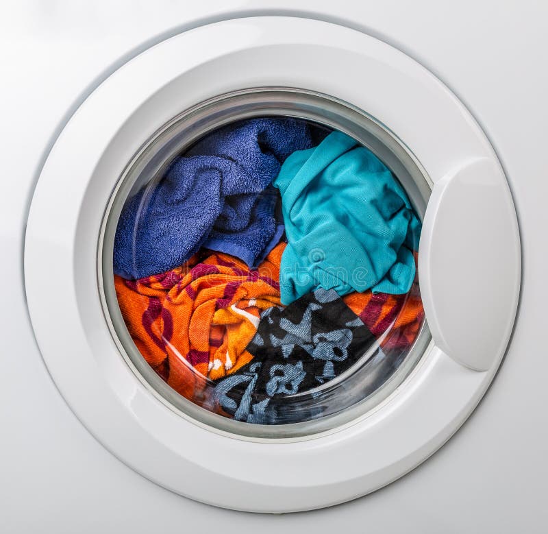 Washing machine with color clothes stock photo Washing machine with color clothes stock photo