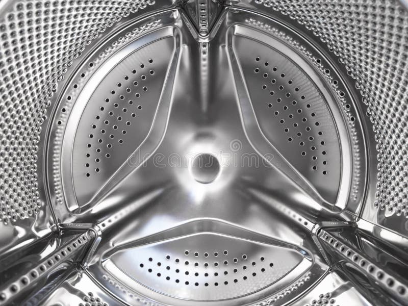 Perforated Shiny Metal Surface. Drum of Washing Machine Close Up Stock