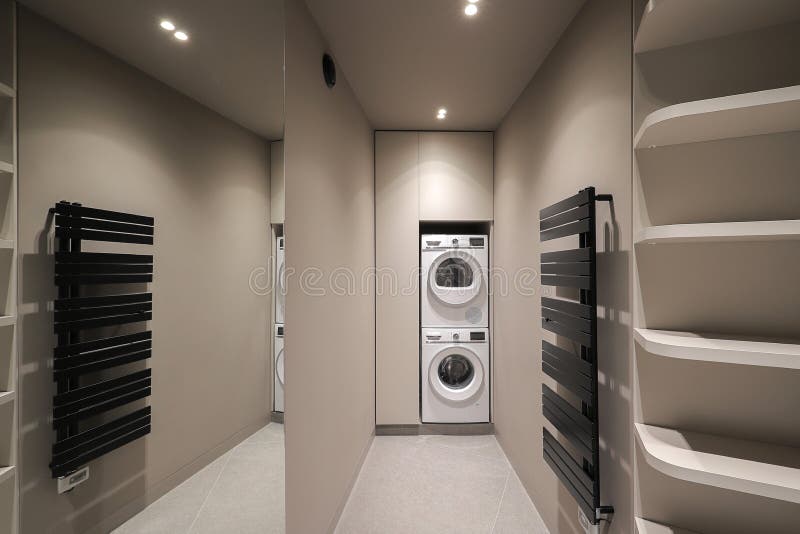 Washing Machine Inside Empty Dressing Room Interior with Shelves Stock