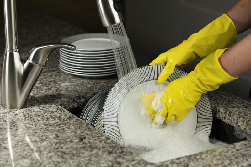 Washing a plates stock image. Image of housework, furniture 26155577