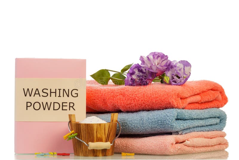 Washing powder and towels royalty free stock photography